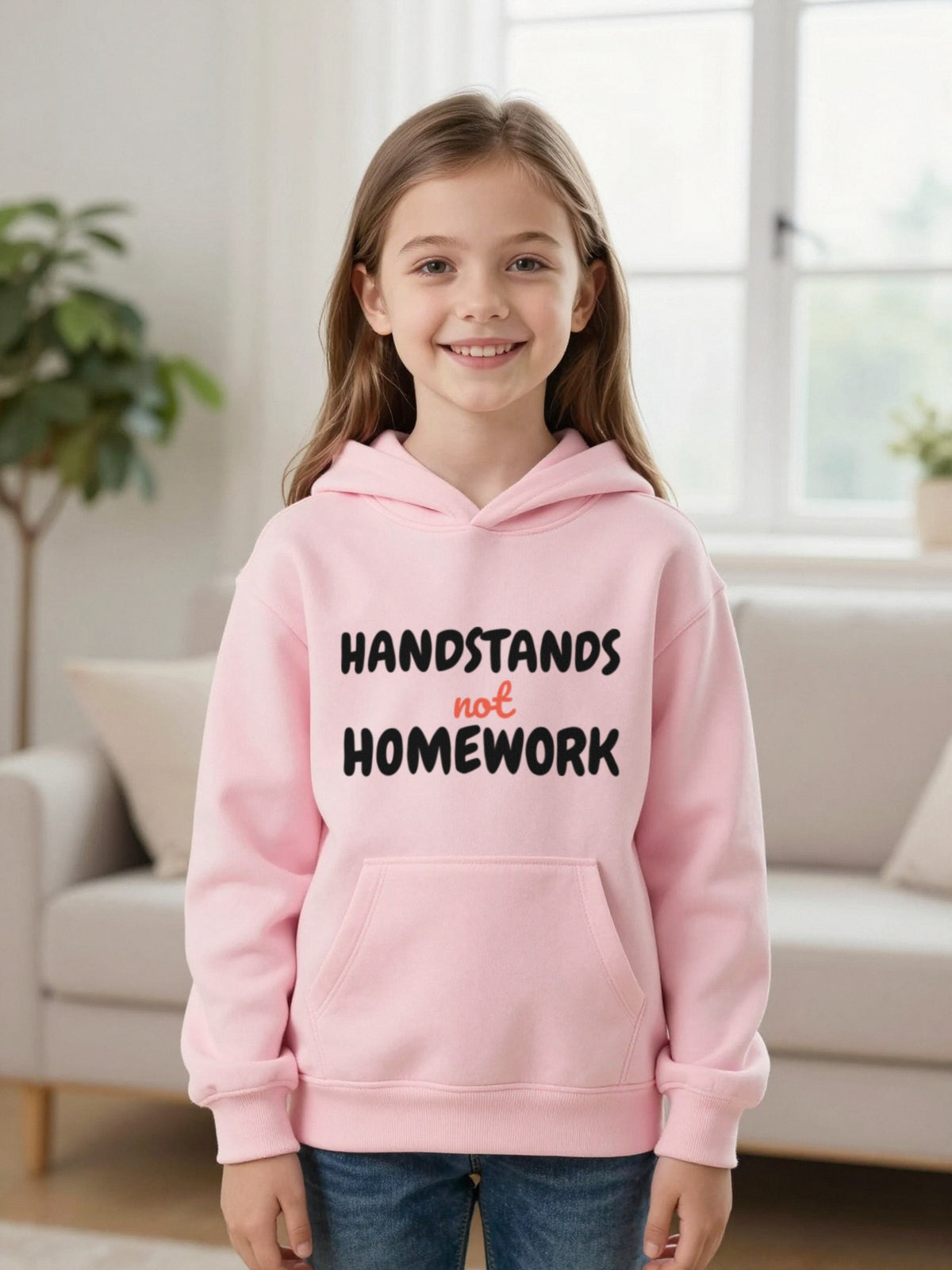 Kids Handstands Not Homework T-Shirt, Sweatshirt & Hoodie Hoodie in Light Pink, worn by a child