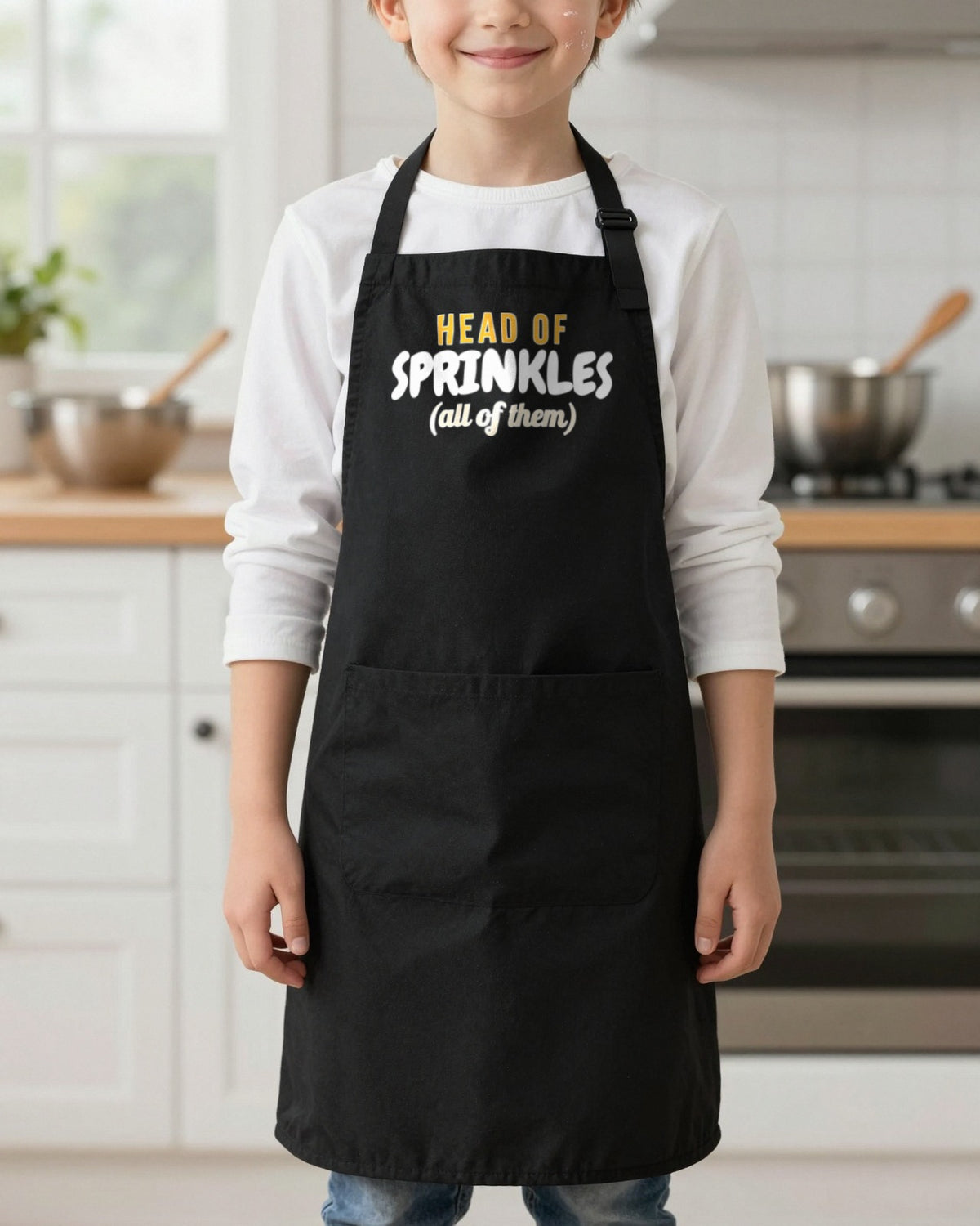 Head Of Sprinkles kids apron in Black, worn, our photo