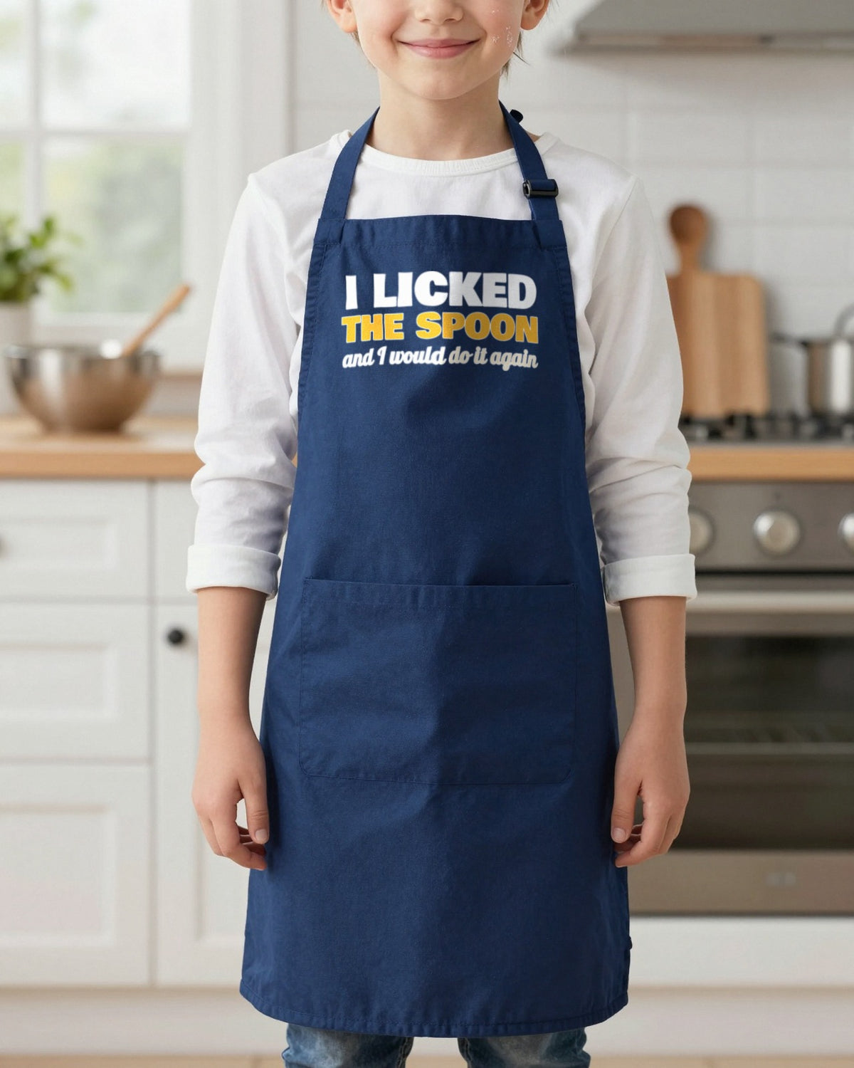 I Licked The Spoon kids apron in Navy, worn, our photo