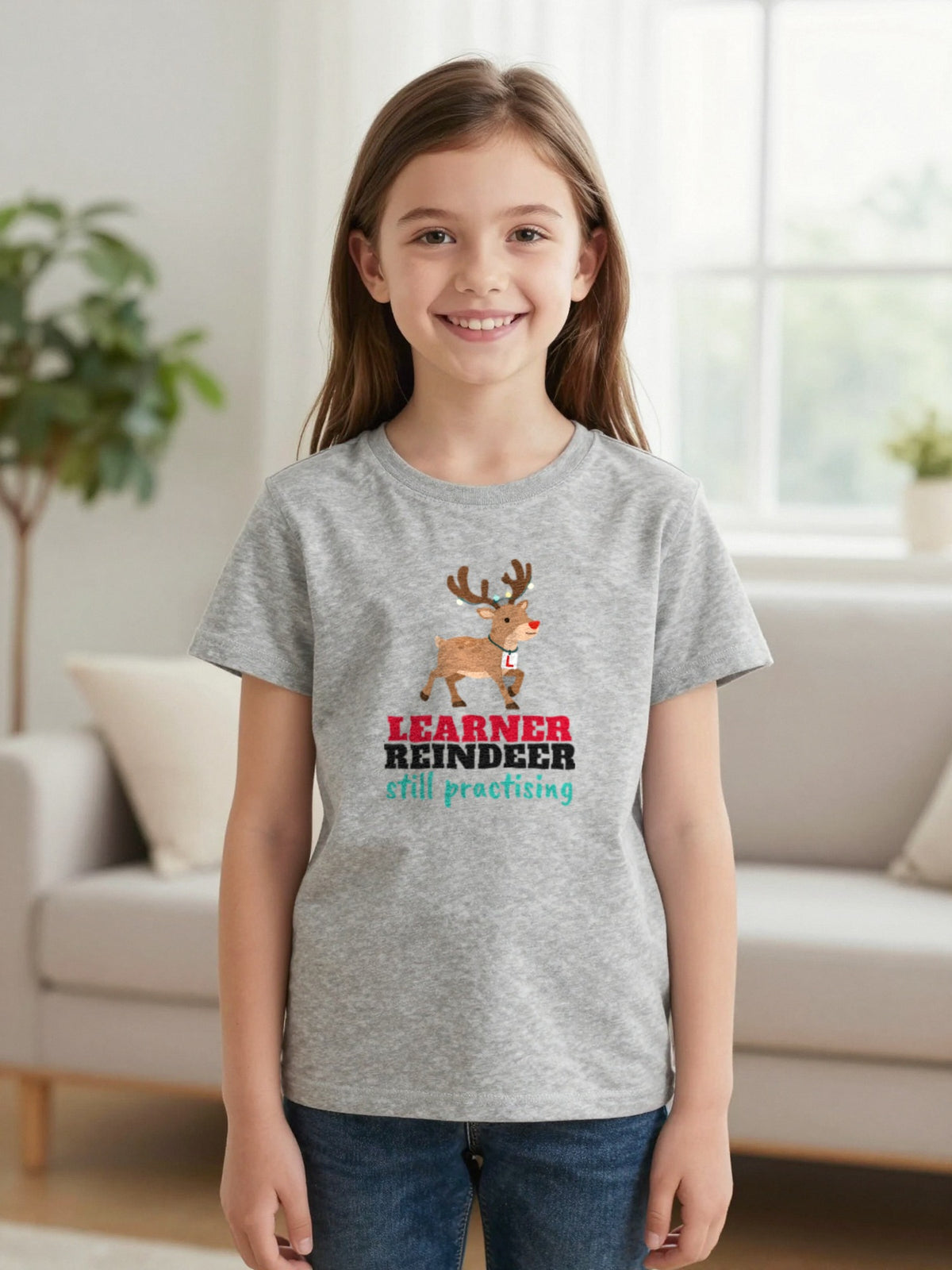 Kids Learner Reindeer Christmas T-Shirt & Jumper worn by a child