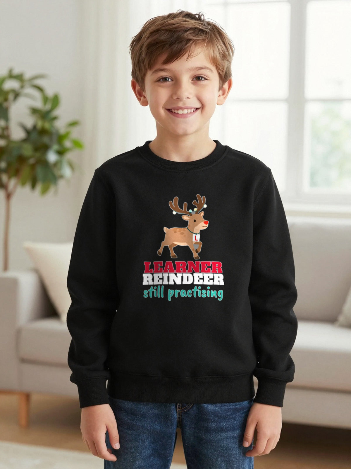 Kids Learner Reindeer Christmas T-Shirt & Jumper worn by a child, another colour