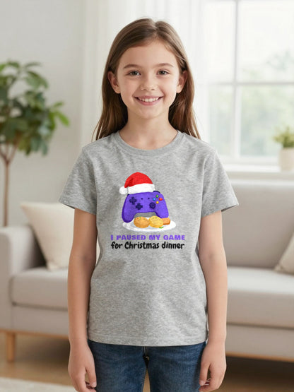 Kids I Paused My Game For Christmas Dinner Christmas T-Shirt & Jumper worn by a child