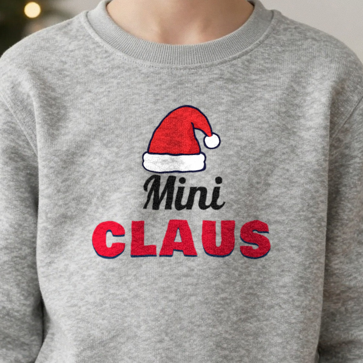 Kids Personalised Claus Christmas Jumper & T-Shirt close-up