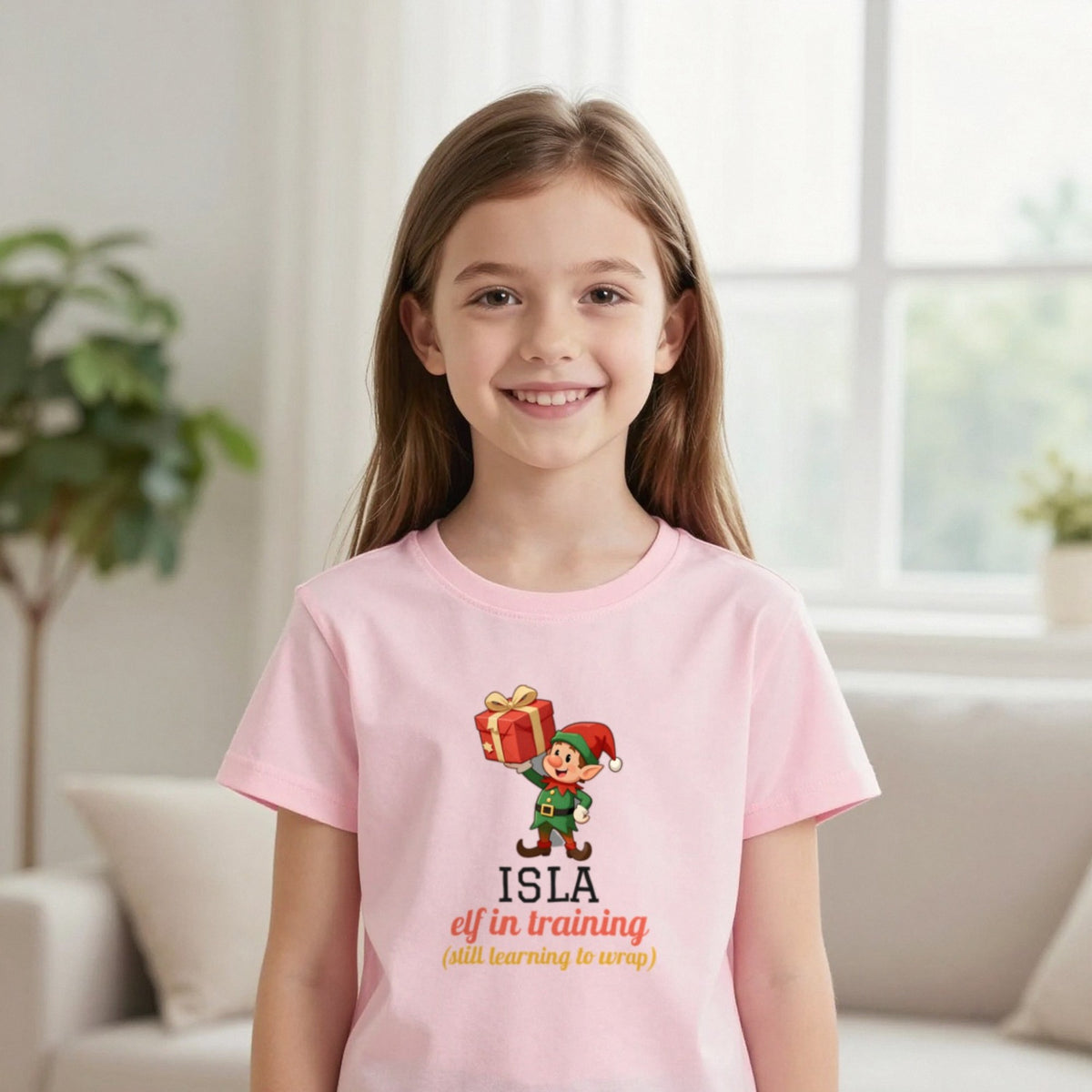 Kids Personalised Elf In Training Christmas T-Shirt & Sweatshirt T-Shirt in Light Pink, worn, our photo