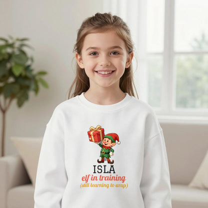 Kids Personalised Elf In Training Christmas T-Shirt & Sweatshirt Sweatshirt in White, worn, our photo