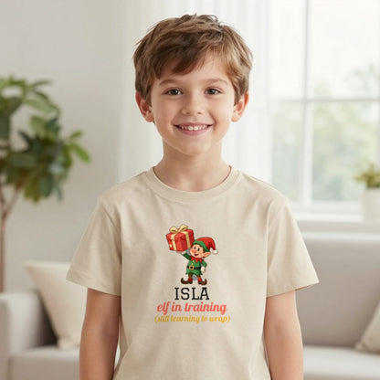 Kids Personalised Elf In Training Christmas T-Shirt & Sweatshirt T-Shirt in Sand, worn, our photo