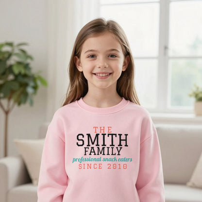 Kids Personalised Family Surname T-Shirt & Sweatshirt Sweatshirt in Light Pink, worn, our photo