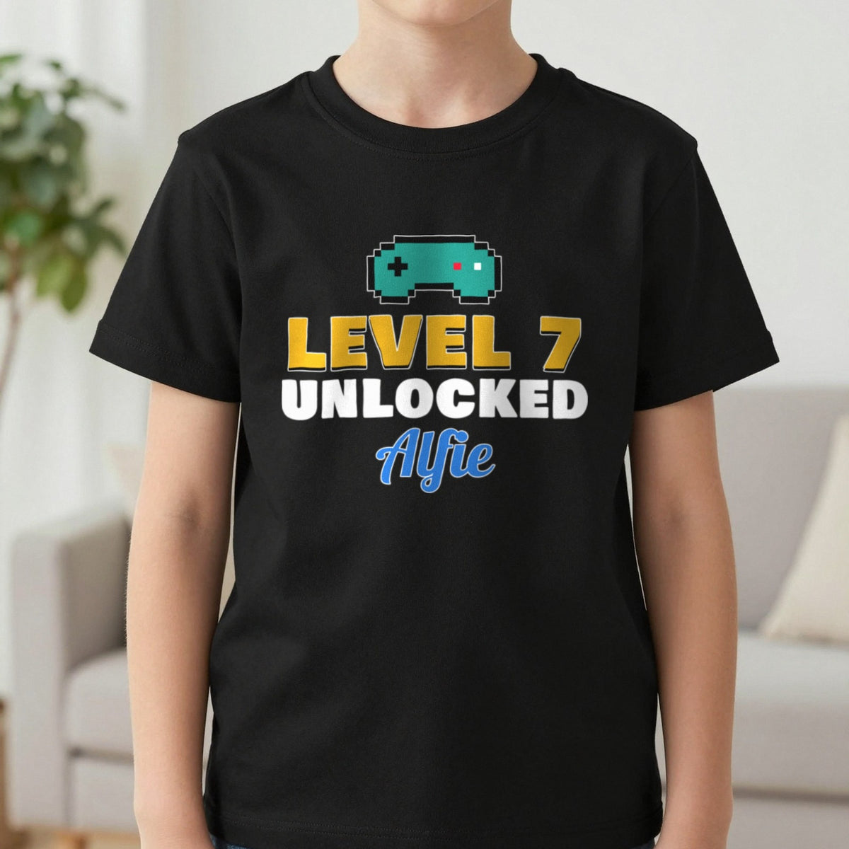 Kids Personalised Level Unlocked Birthday T-Shirt & Sweatshirt T-Shirt in Black, worn, our photo