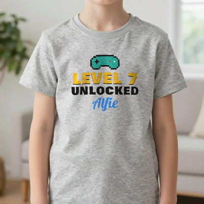 Kids Personalised Level Unlocked Birthday T-Shirt & Sweatshirt T-Shirt in Sport Grey, worn, our photo
