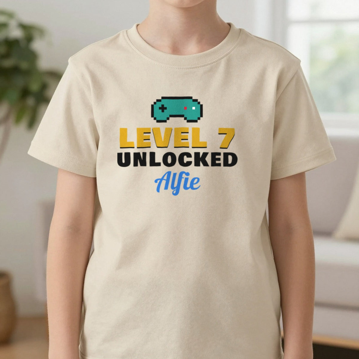 Kids Personalised Level Unlocked Birthday T-Shirt & Sweatshirt T-Shirt in Sand, worn, our photo