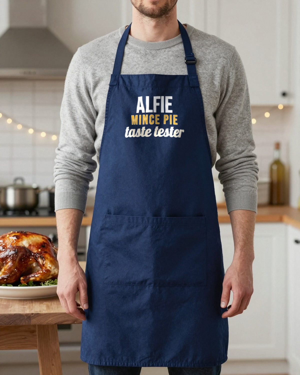 Kids Name Mince Pie Taste Tester Christmas apron in Navy, worn, our photo