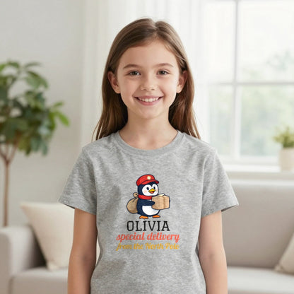 Kids Personalised North Pole Delivery Christmas T-Shirt & Sweatshirt T-Shirt in Sport Grey, worn, our photo