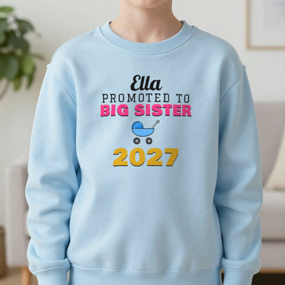 Kids Personalised Promoted To Big Sister T-Shirt Sweatshirt in Light Blue, worn, our photo