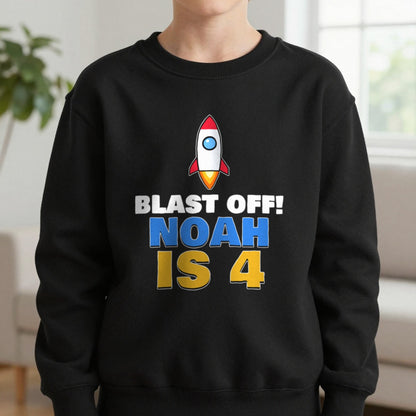 Kids Personalised Space Rocket Birthday T-Shirt Sweatshirt in Black, worn, our photo