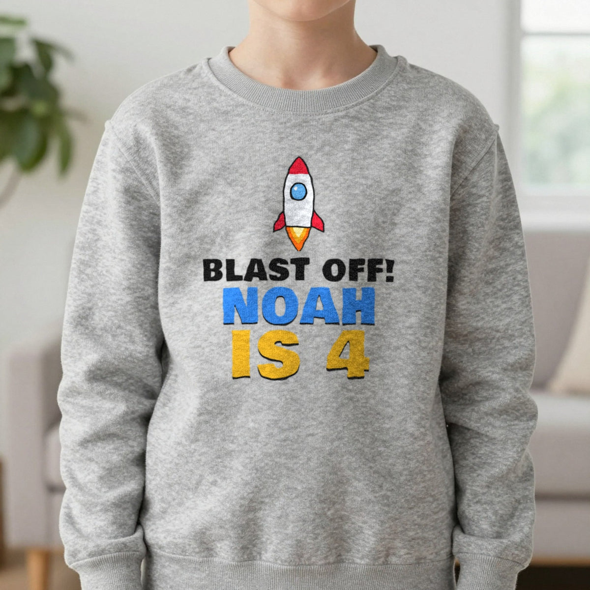Kids Personalised Space Rocket Birthday T-Shirt Sweatshirt in Sport Grey, worn, our photo