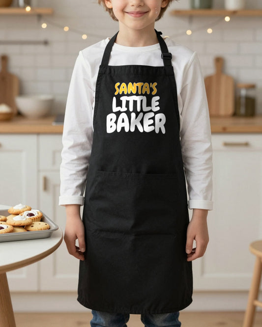 Santa's Little Baker kids apron in Black, worn, our photo