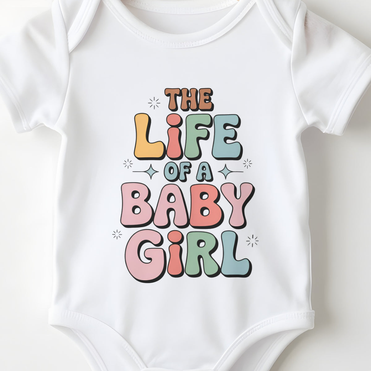 The Life Of A Baby Girl baby grow print close-up