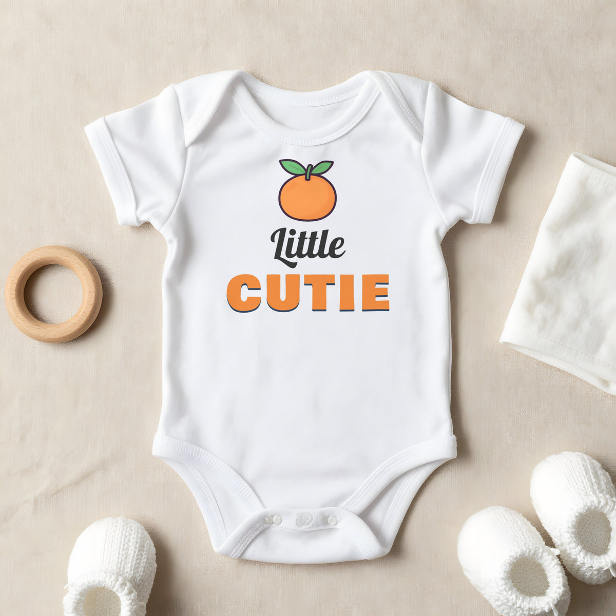 Little Cutie baby grow laid flat