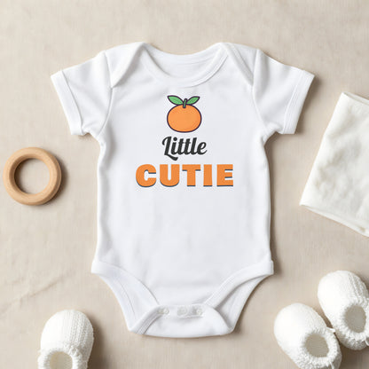 Little Cutie baby grow laid flat