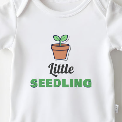 Little Seedling baby grow print close-up
