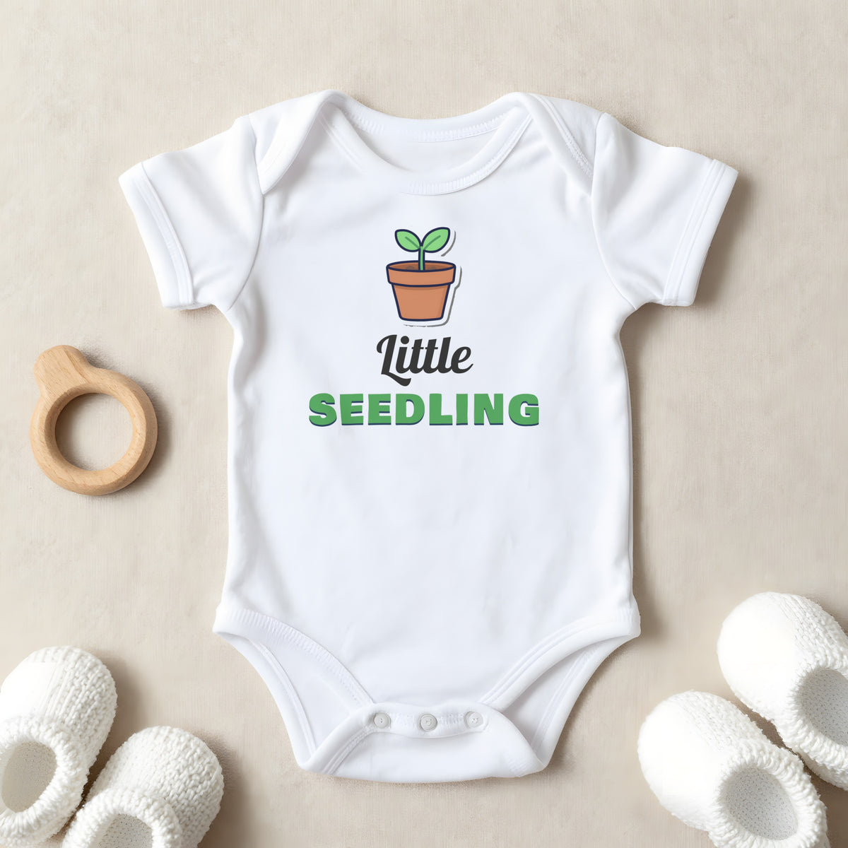 Little Seedling baby grow laid flat