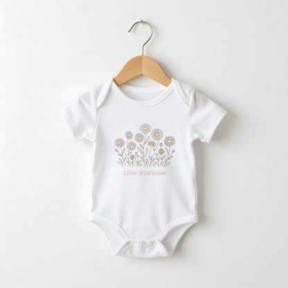 Little Wildflower white baby grow on a hanger