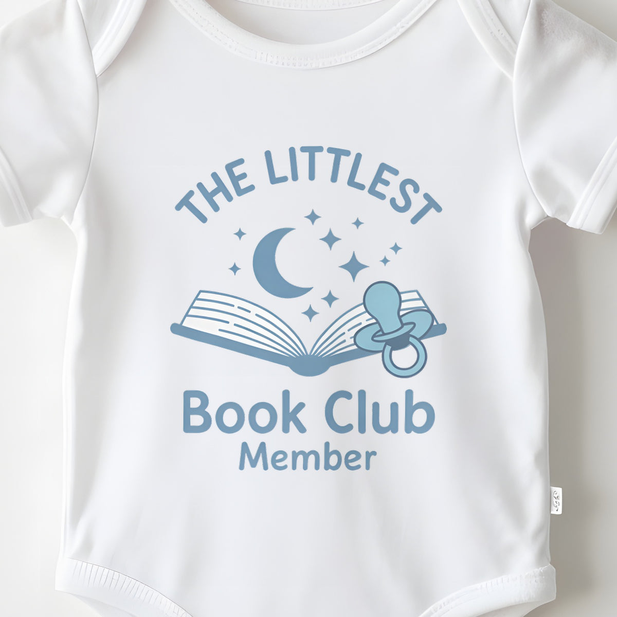 The Littlest Book Club Member baby grow print close-up
