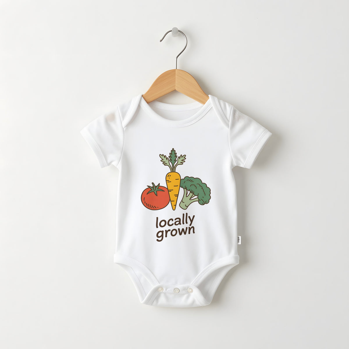 Locally Grown white baby grow on a hanger