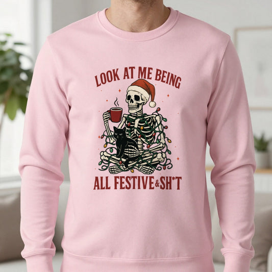 Festive Skeleton Christmas Sweatshirt in Light Pink, worn, our photo