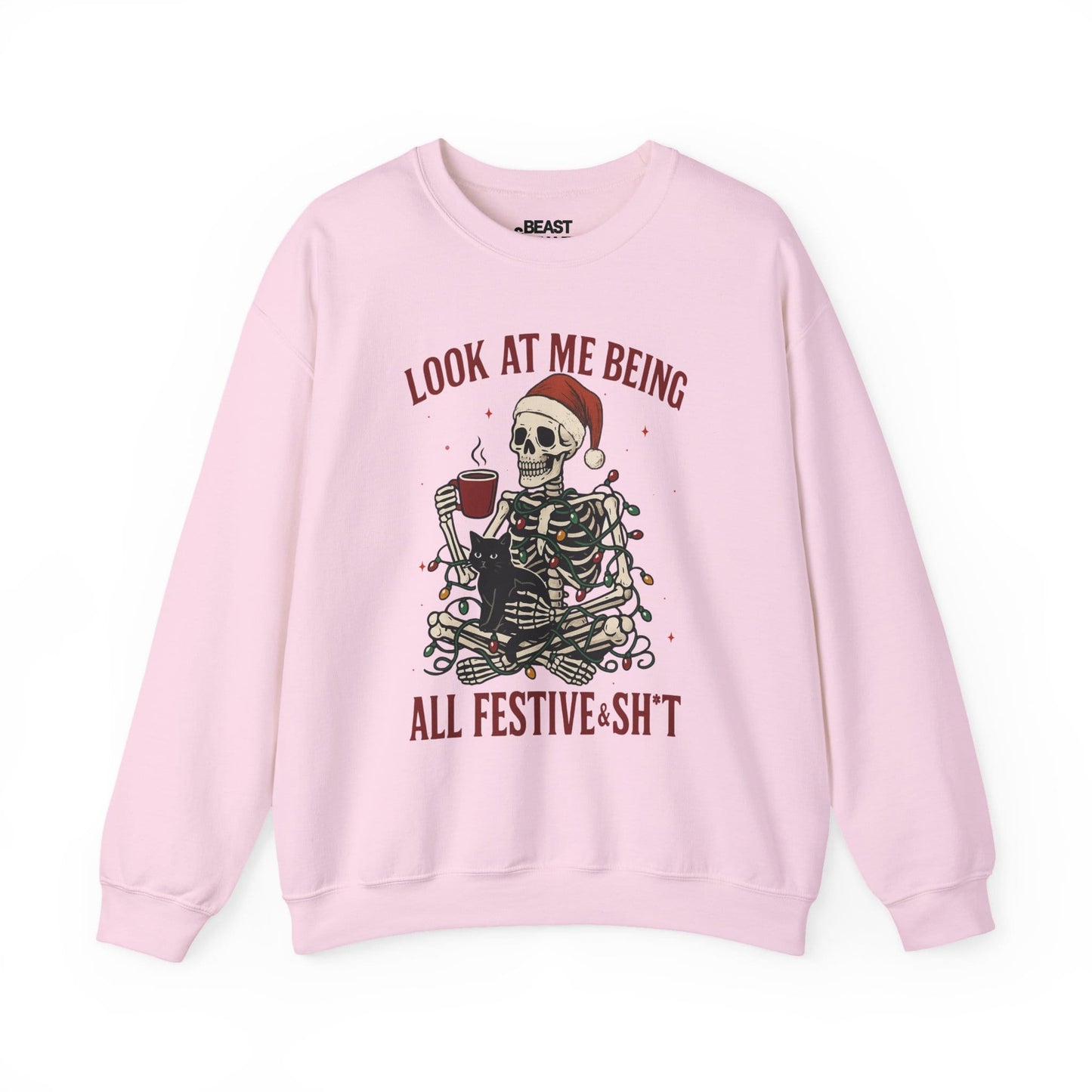 light pink sweatshirt with funny skeleton christmas graphic