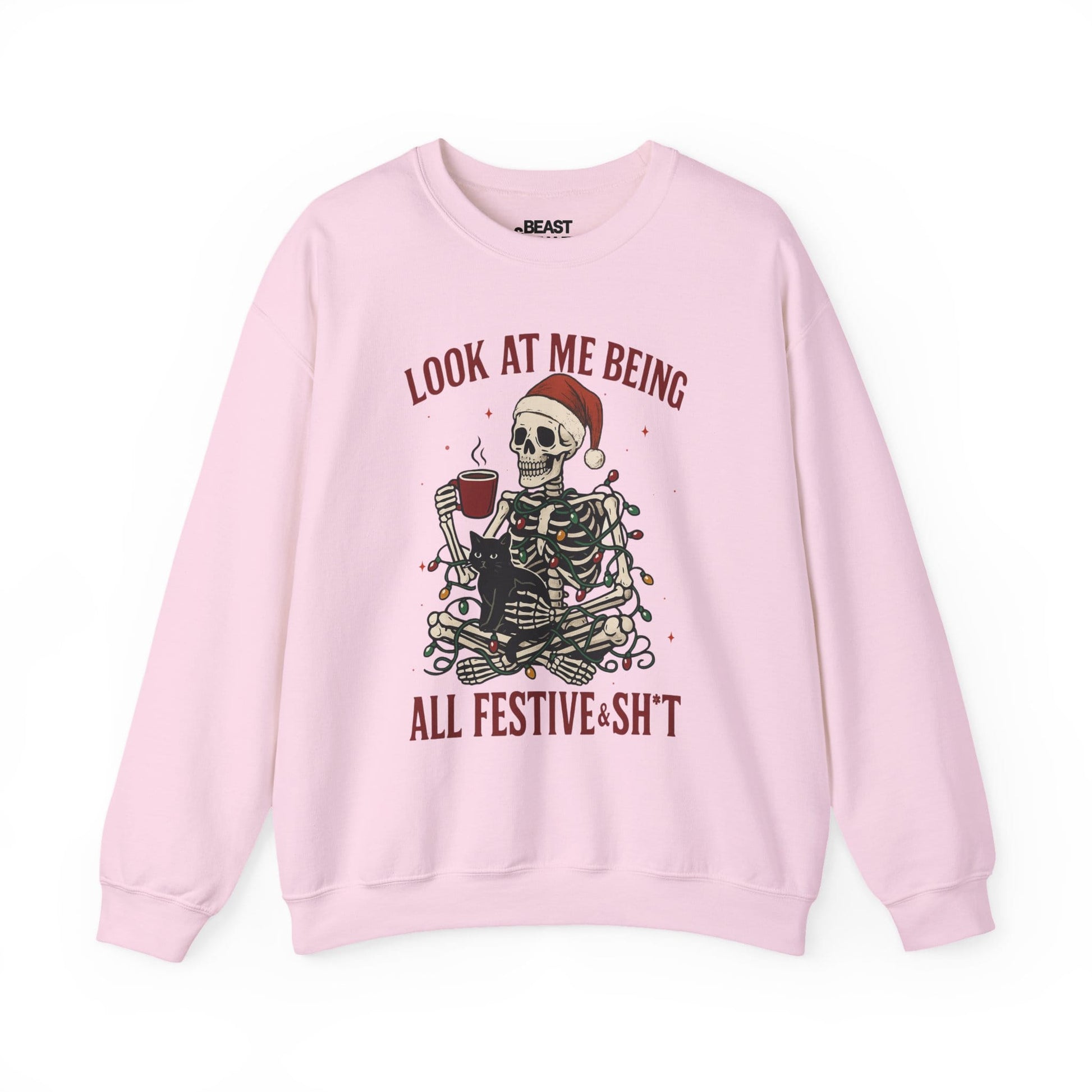light pink sweatshirt with funny skeleton christmas graphic