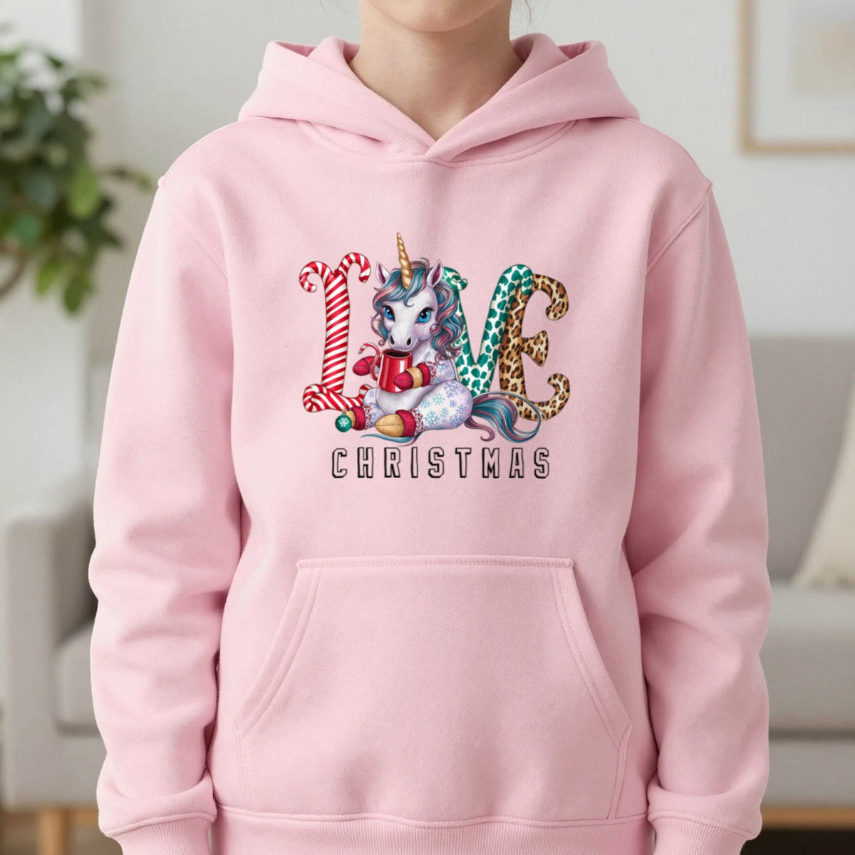 Love Christmas Unicorn Kids Hoodie in Light Pink, worn, our photo