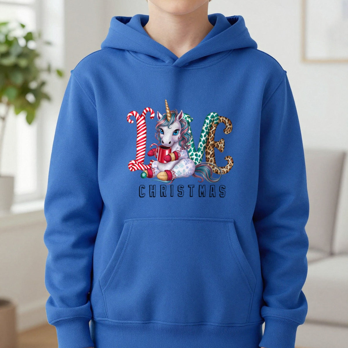 Love Christmas Unicorn Kids Hoodie in Royal, worn, our photo