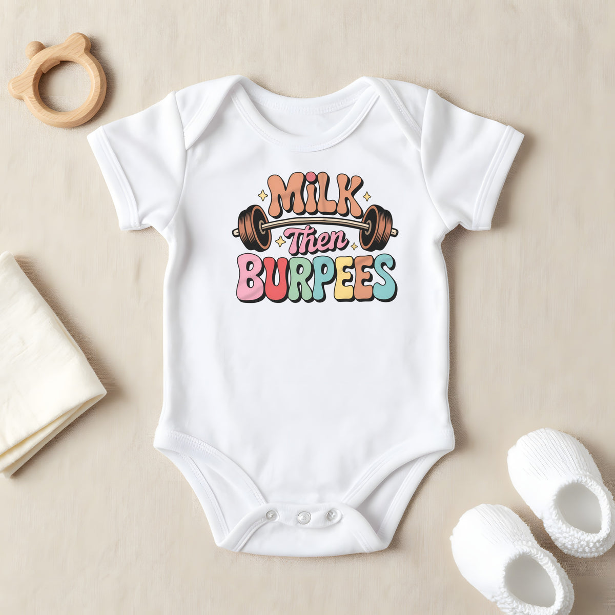 Milk Then Burpees baby grow laid flat