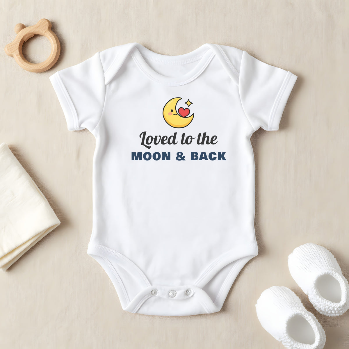 Loved To The Moon And Back baby grow laid flat