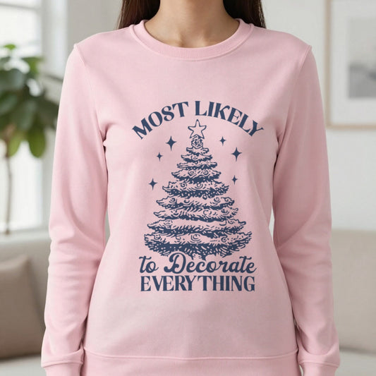 Most Likely To Decorate Everything Christmas Sweatshirt in Light Pink, worn, our photo