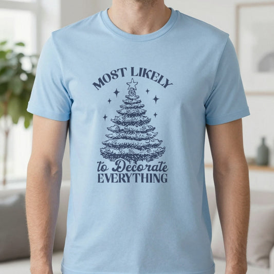 Most Likely to Decorate Everything Christmas T-Shirt in Light Blue, worn, our photo