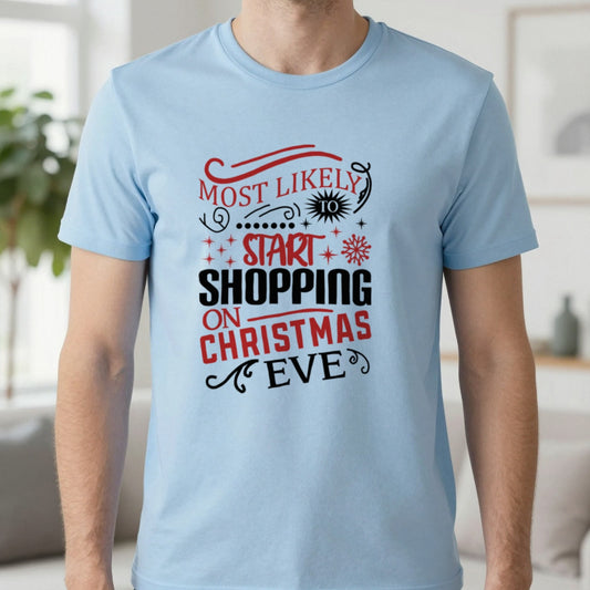 Most Likely to Start Shopping on Christmas Eve T-Shirt in Light Blue, worn, our photo
