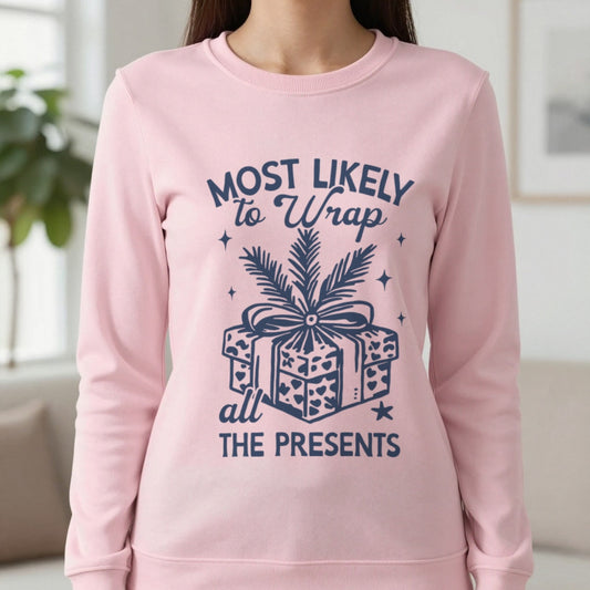 Most Likely To Wrap All The Presents Christmas Sweatshirt in Light Pink, worn, our photo