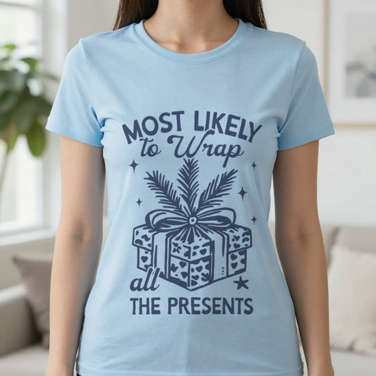 Most Likely to Wrap All the Presents Christmas T-Shirt in Light Blue, worn, our photo
