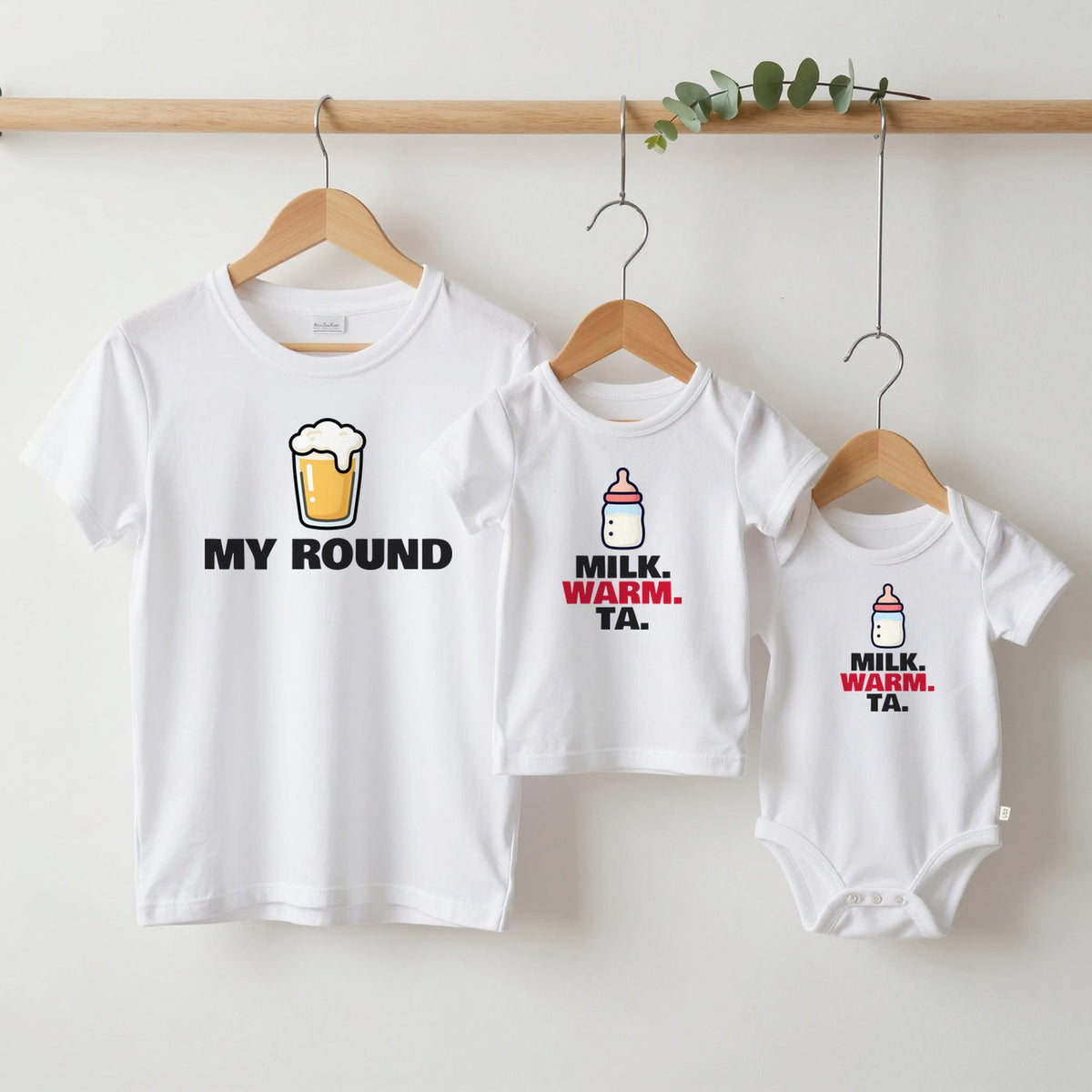 My Round & Milk Warm Ta matching set grown-up tee, kids tee and baby grow on hangers