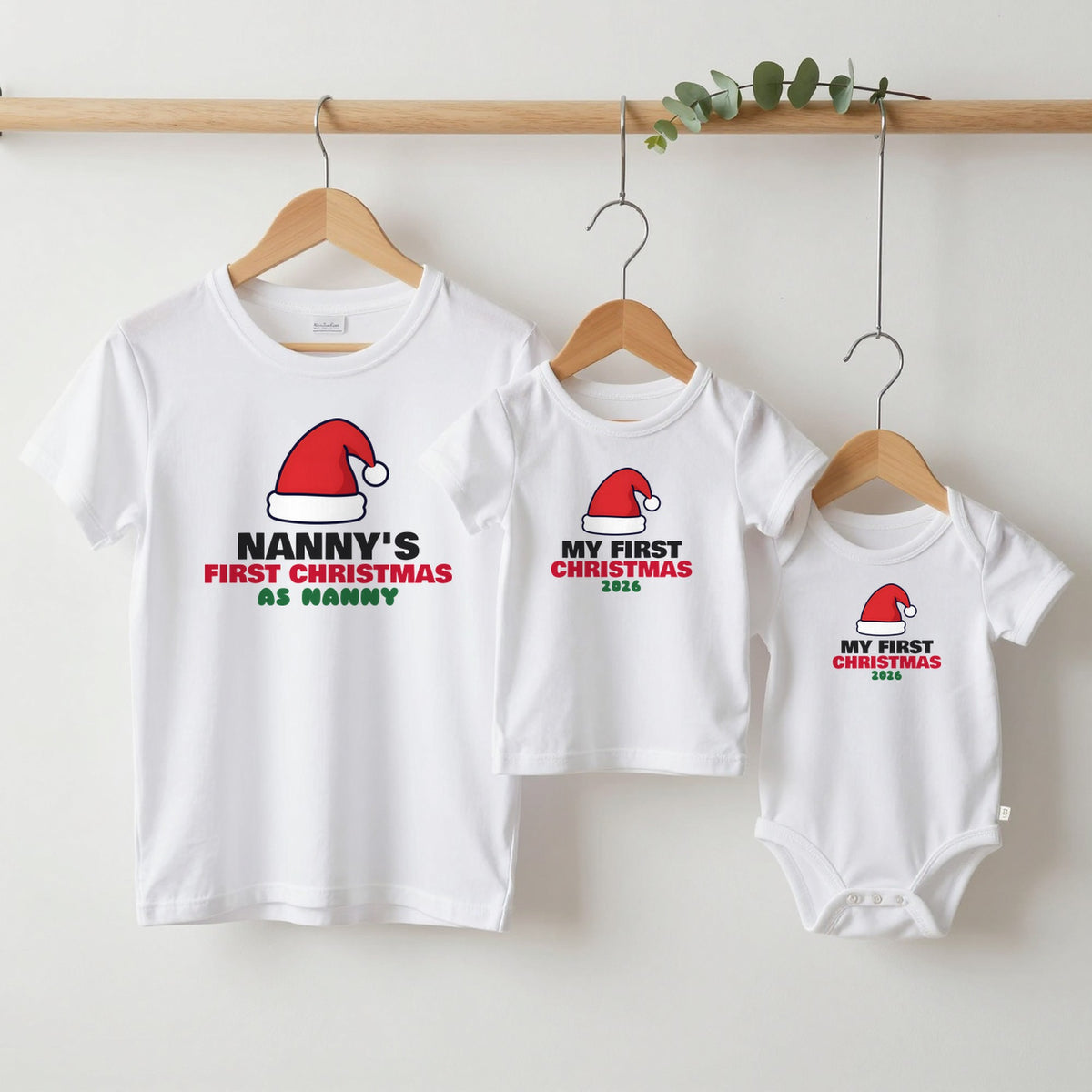 Nanny's First Christmas & My First Christmas matching set grown-up tee, kids tee and baby grow on hangers