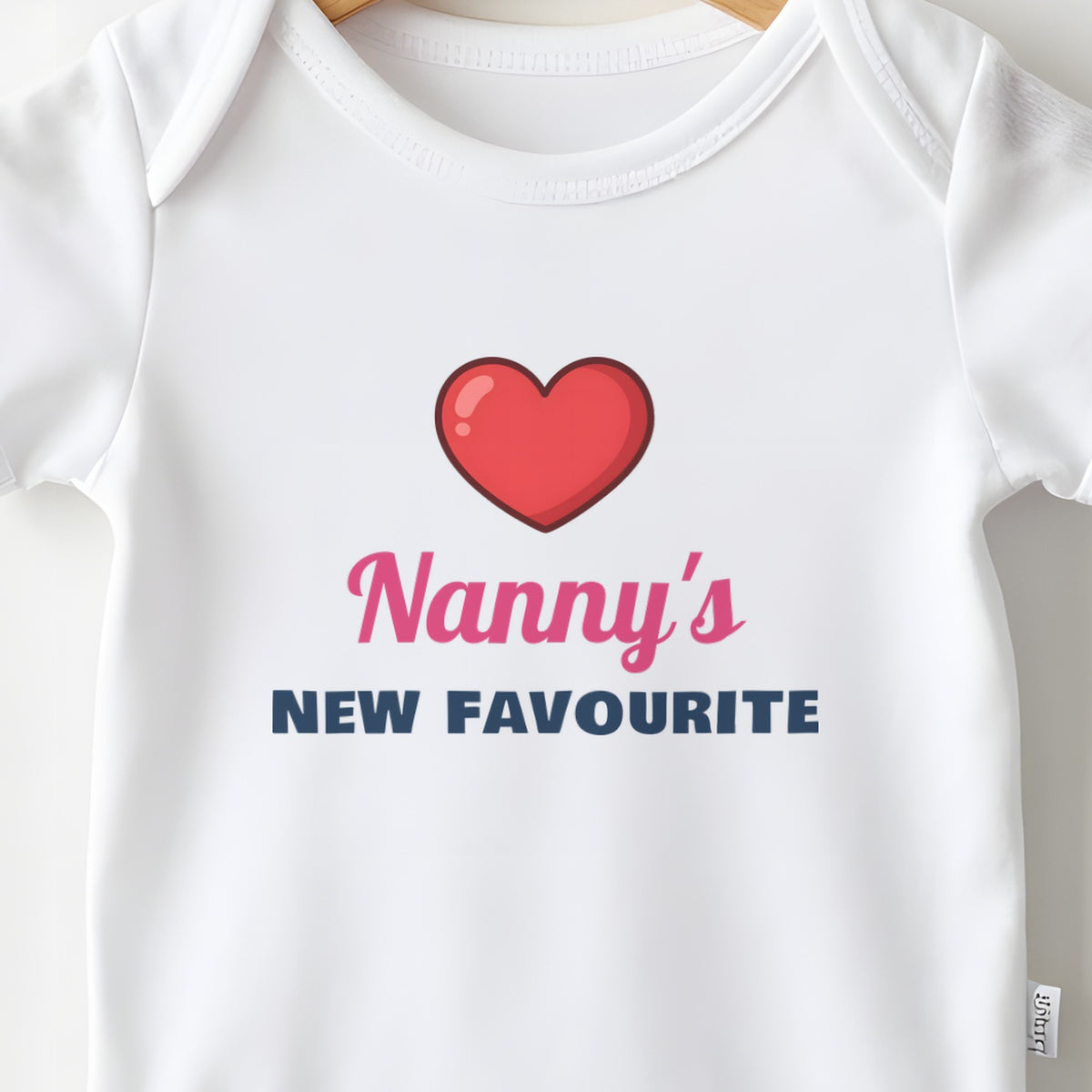 Nanny's New Favourite baby grow print close-up