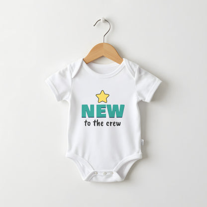 New To The Crew white baby grow on a hanger