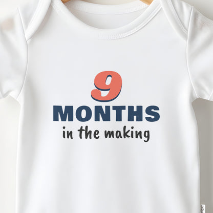 9 Months In The Making baby grow print close-up