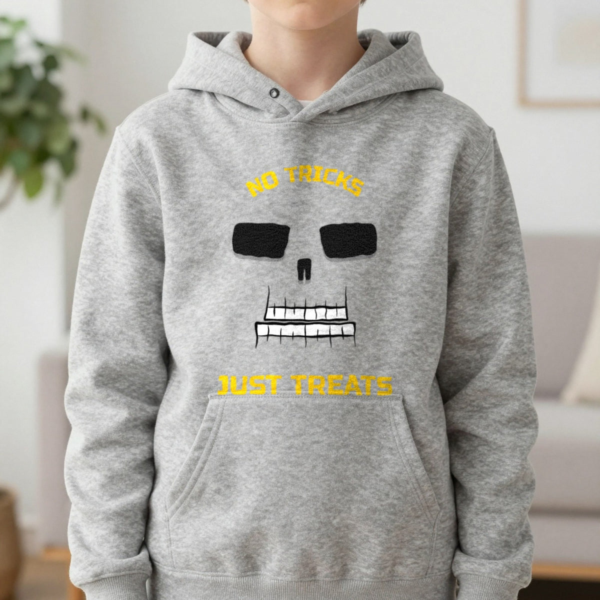 No Tricks Just Treats Skeleton Halloween Kids Hoodie in Sport Grey, worn, our photo