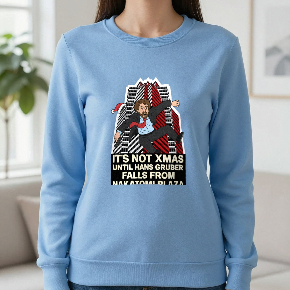 Not Xmas Until He Falls From The Plaza Christmas T-Shirt & Sweatshirt in Carolina Blue, worn, our photo