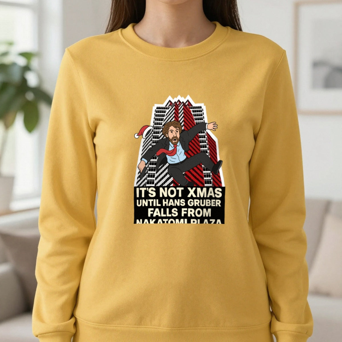 Not Xmas Until He Falls From The Plaza Christmas T-Shirt & Sweatshirt in Gold, worn, our photo