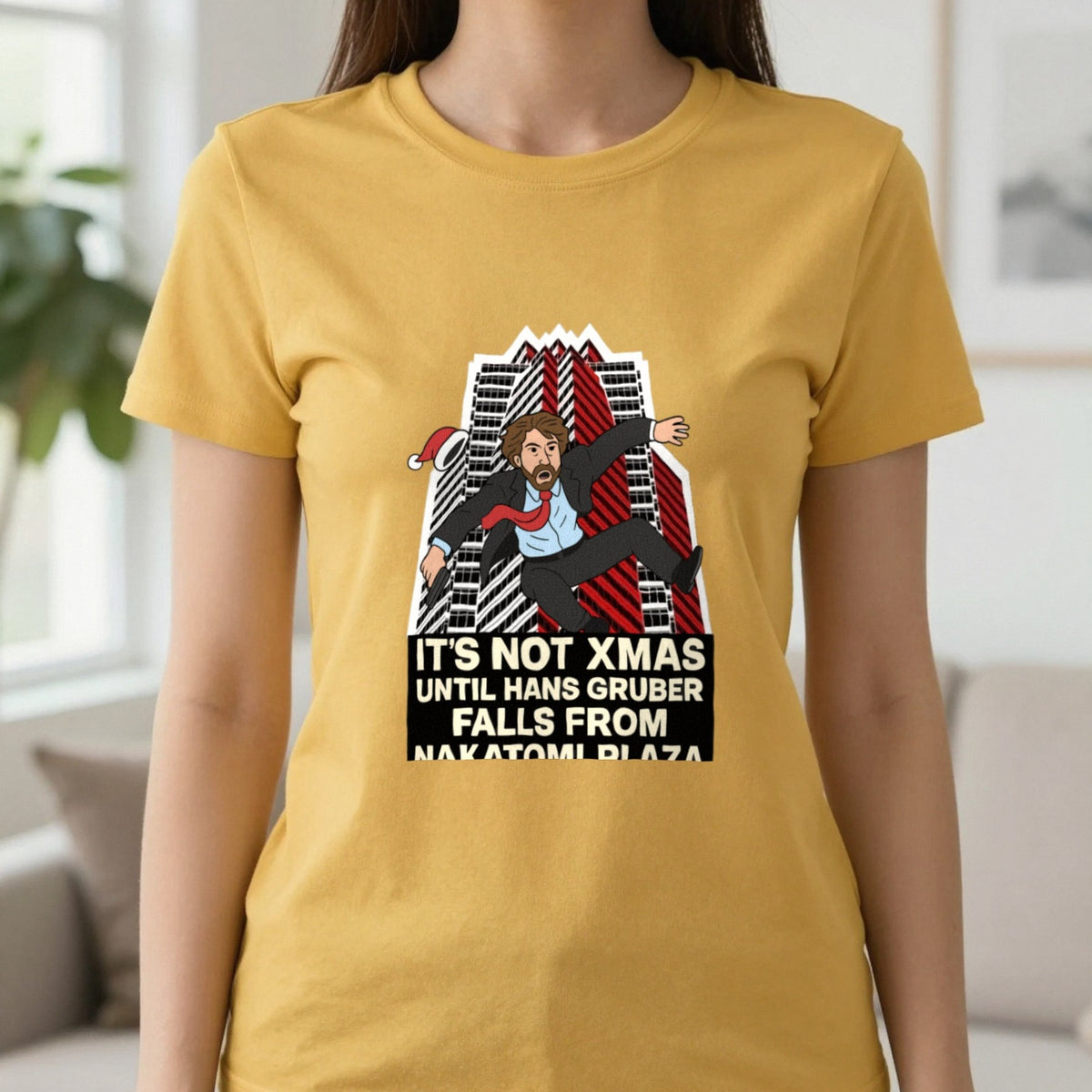 Not Xmas Until He Falls From The Plaza Christmas T-Shirt & Sweatshirt in Gold, worn, our photo