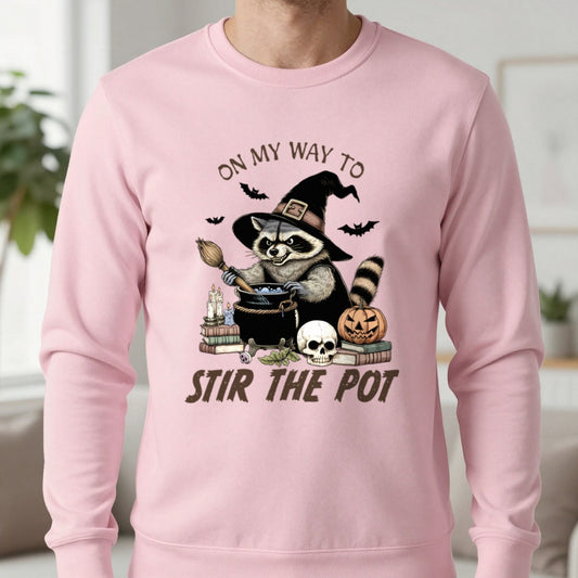 On My Way To Stir The Pot Halloween Raccoon Sweatshirt in Light Pink, worn, our photo